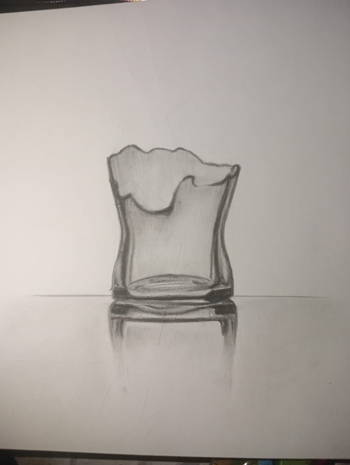 Pencil drawing of a thin glass vase with its reflection on a polished surface